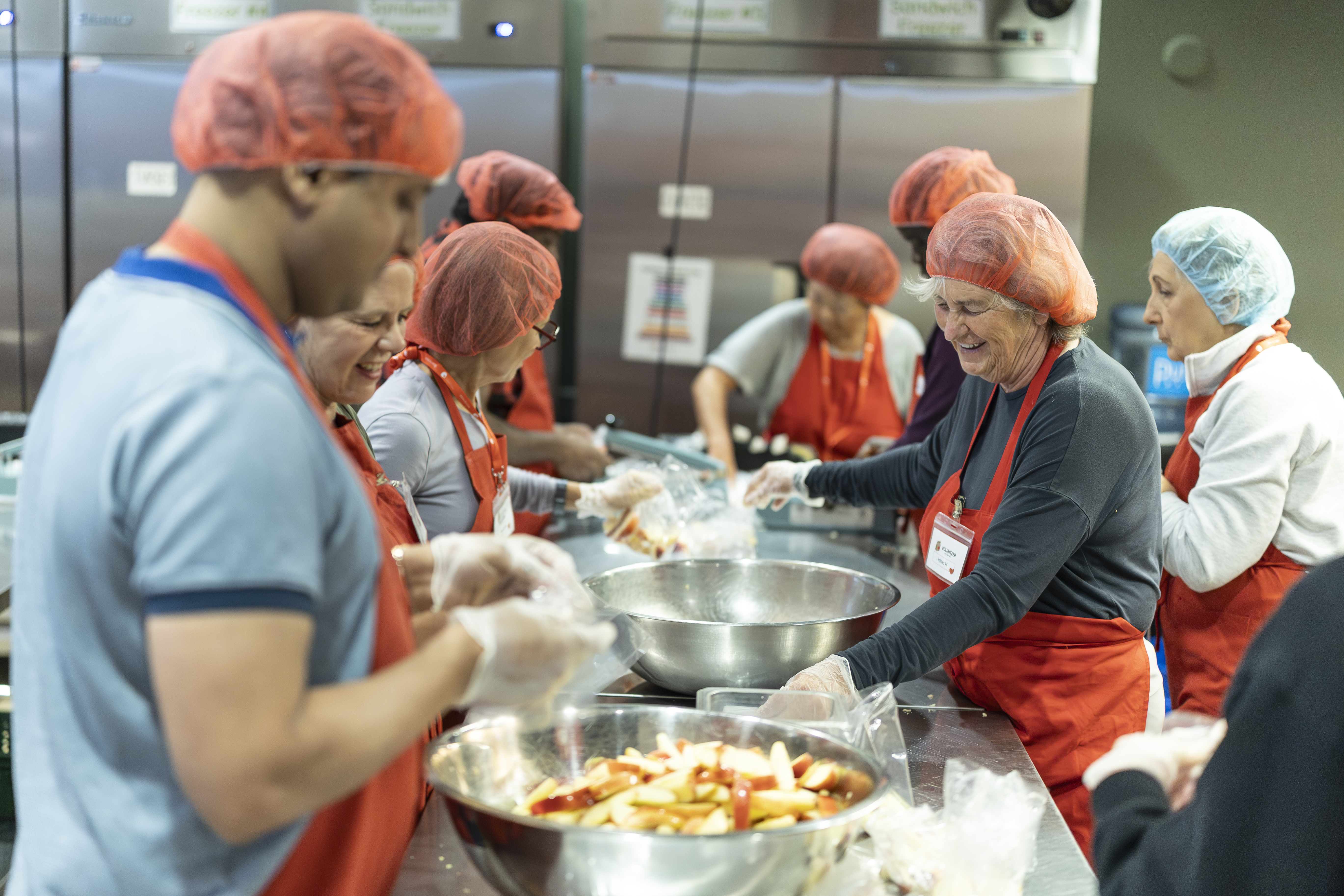 Volunteers preparing lunches for kids across Calgary